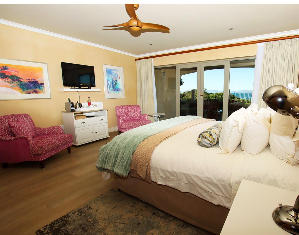 Spacious double room with sea views and private balcony at On The Cliff Guesthouse, Hermanus.