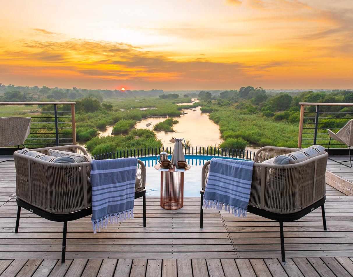 Sunrise view from the pool deck at Kruger Shalati, South Africa.