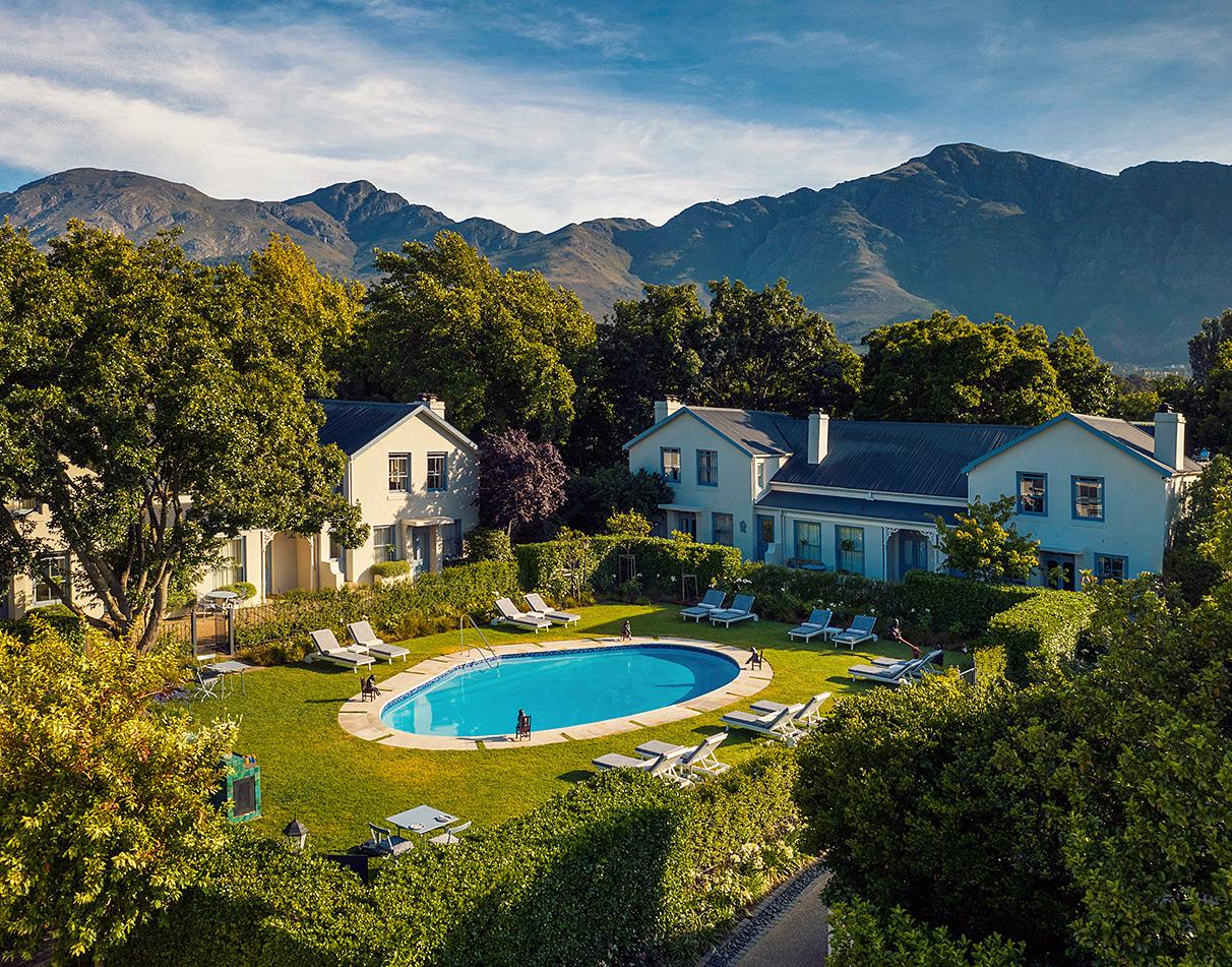 Arial view of the building of Le Quartier Francis with a mountain range in the background, Cape Winelands, South Africa.