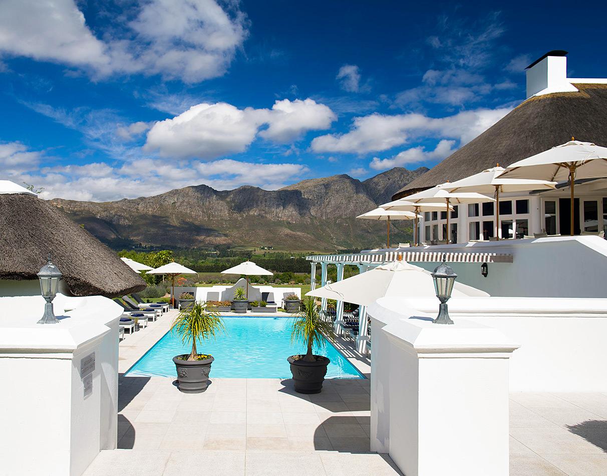 Pool deck with mountain view of Mont Roche Hotel, Cape Winelands, South Africa.