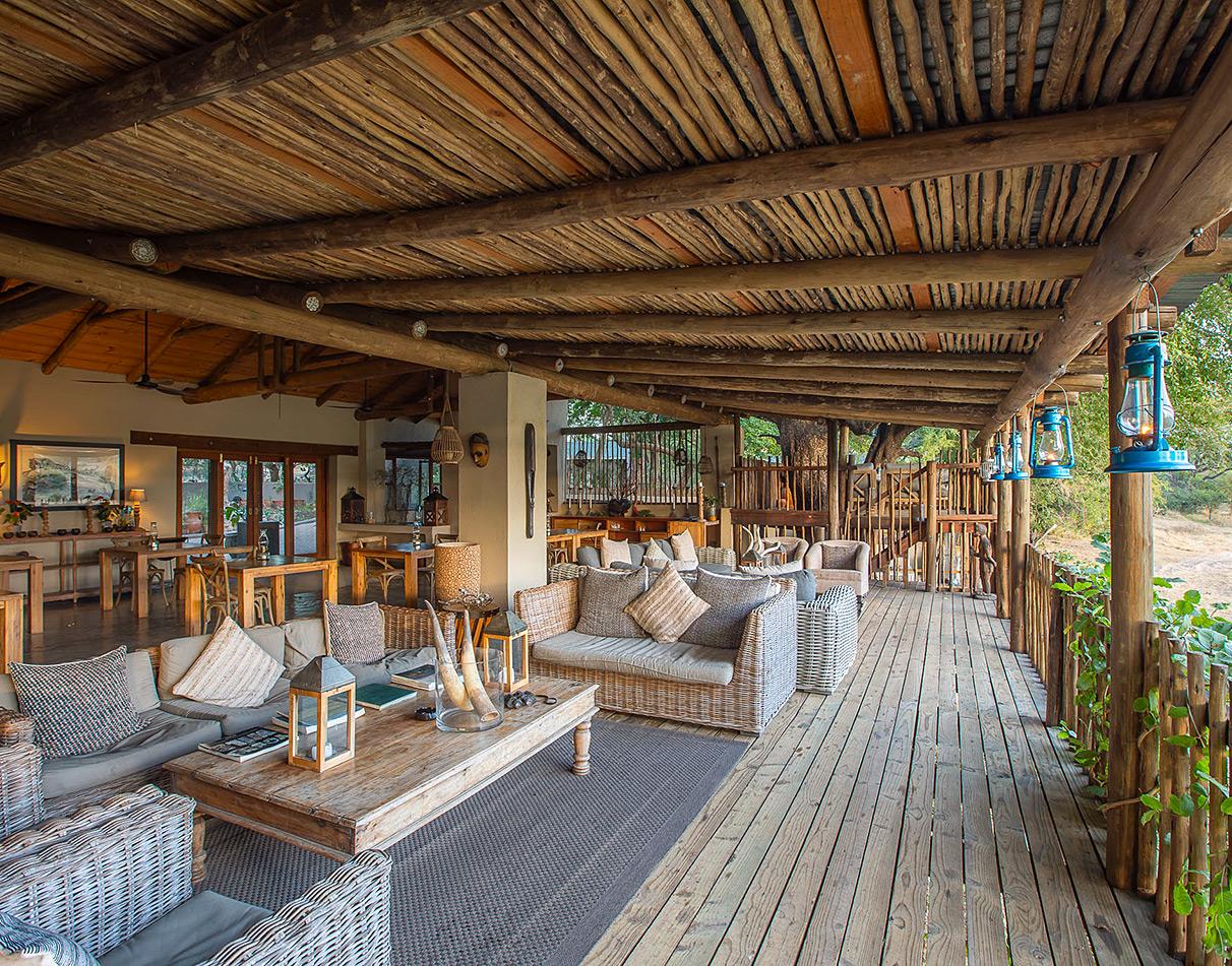 Cozy lounge area on the deck at Nottens Bush Camp, South Africa.