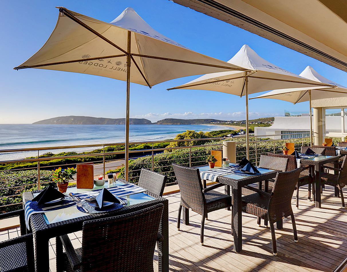 Terrace with ocean view of the Periwinkle Lodge in Plettenberg Bay, South Africa.