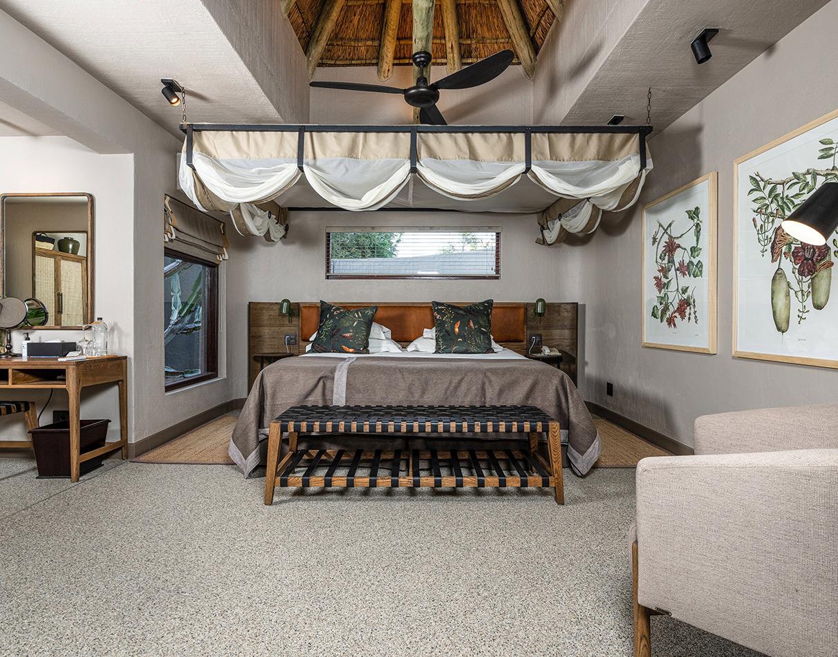 Luxurious Sabi Sabi Bush Lodge bedroom with African-inspired decor