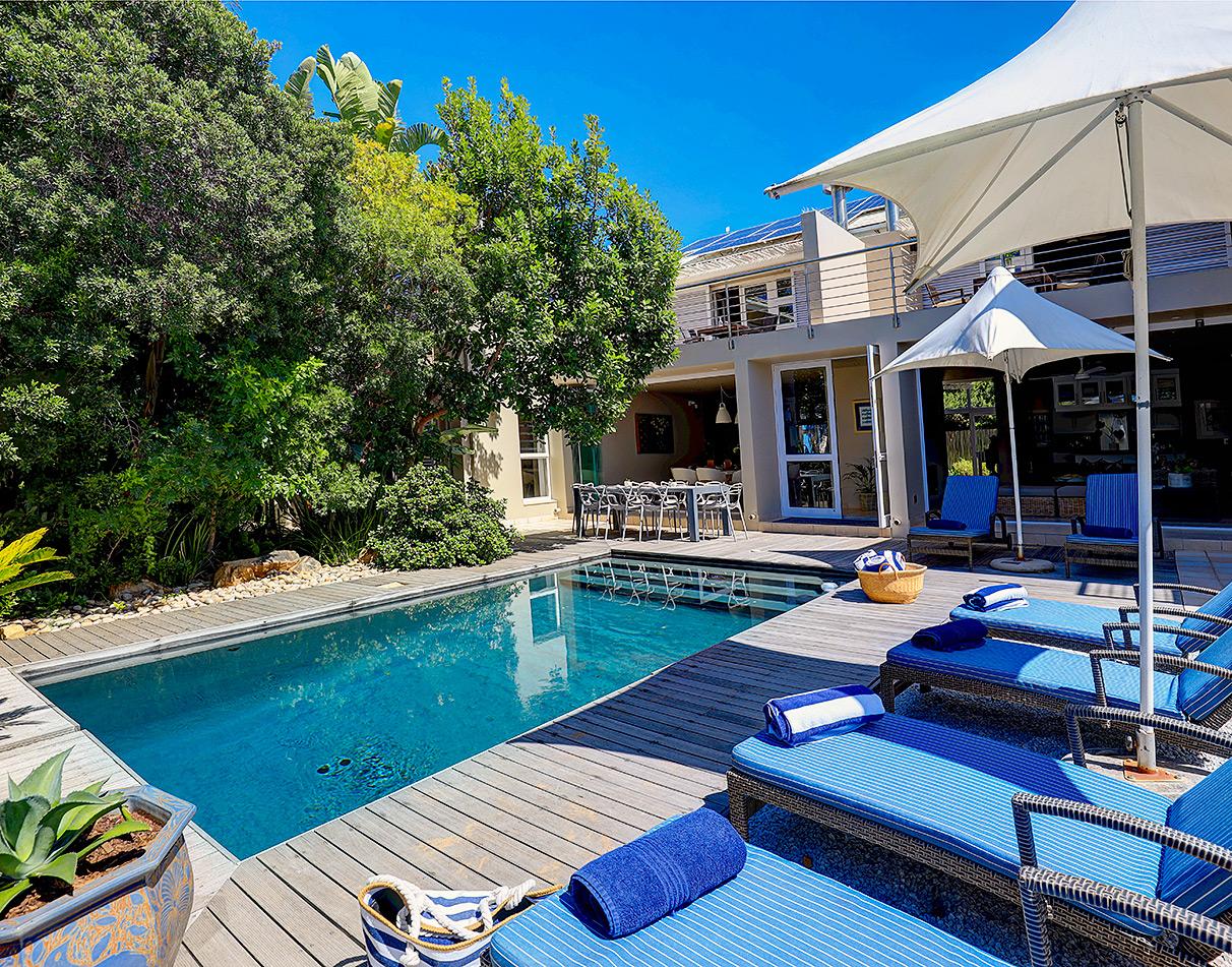 Pool deck in the sun of the Starfish Lodge in Plettenberg Bay, South Africa.