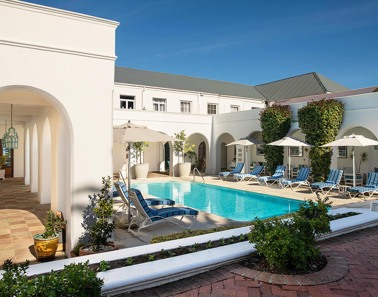 Pool area with sun loungers at The Marine Hotel, Hermanus.