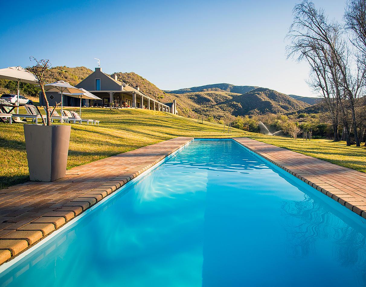 Pool with mountain backdrop, Wilderhondekloof, South Africa.