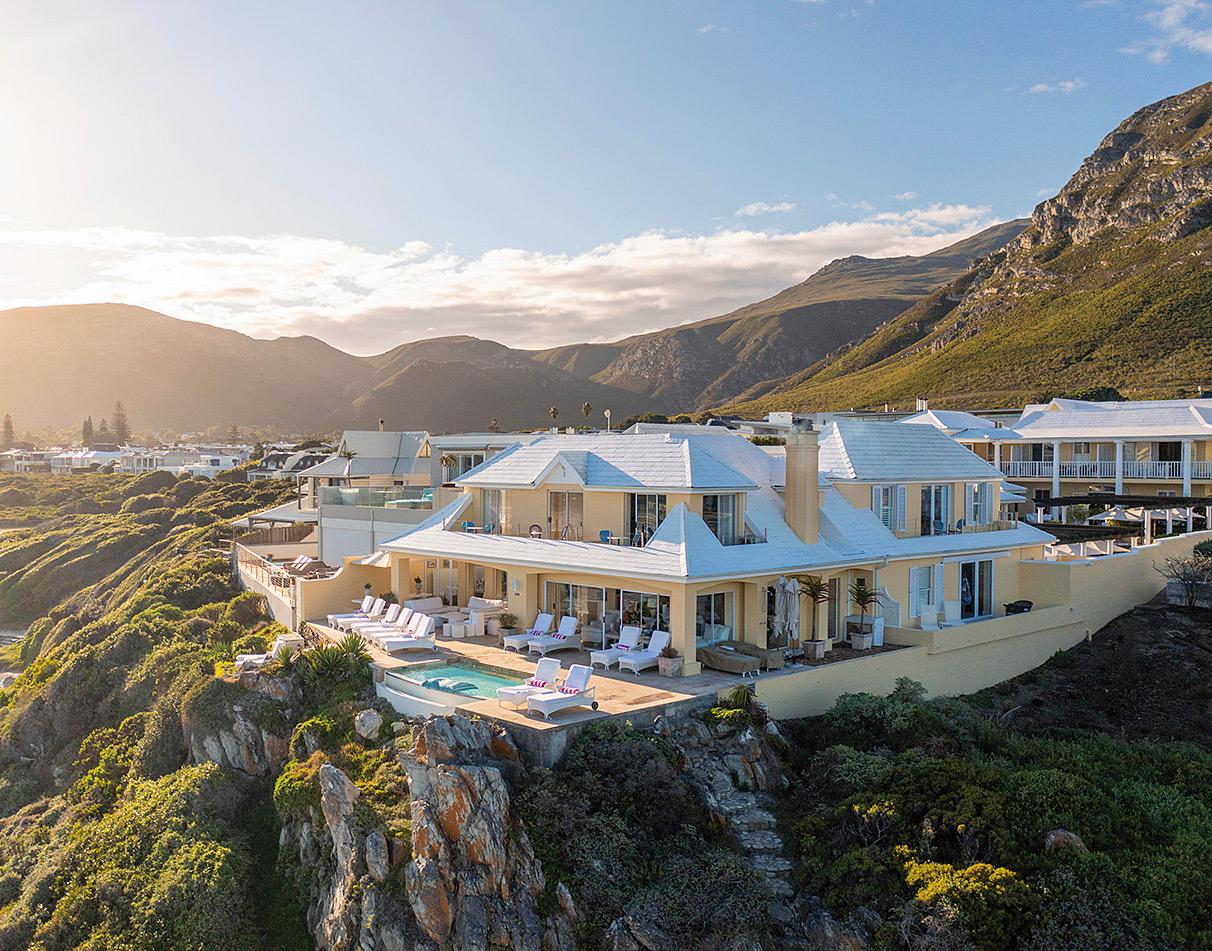 Aerial view of Birkenhead House perched above the ocean.