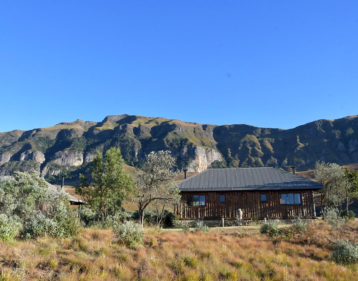A cottage in the mountains at Greenfire Drakensberg Lodge.