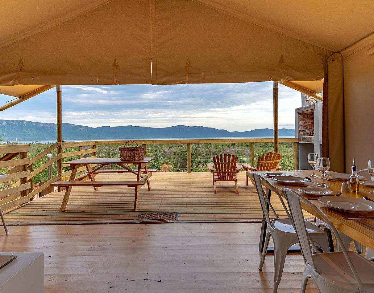 Interior and views from tented unit at Africamps White Elephant, overlooking Pongola Game Reserve.