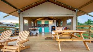 Interior and veranda view of tented accomodation at Africamps White Elephant.