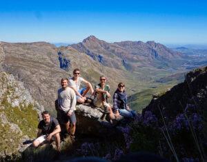 Small group enjoying a scenic hike in the mountains, South African safari.