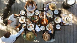 A family sharing lunch together at Londolozi, South Africa.
