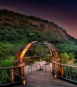 A romantic exterior dining setting at Shamwari Eagles Craig.