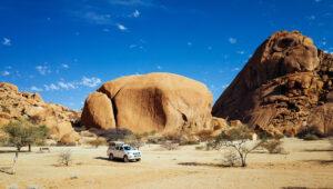4x4 at secluded campsite, Spitzkoppe, Namibia.