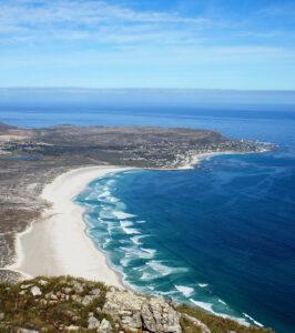 Aerial view of Noordhoek's white sandy beach, Cape Town, South Africa.