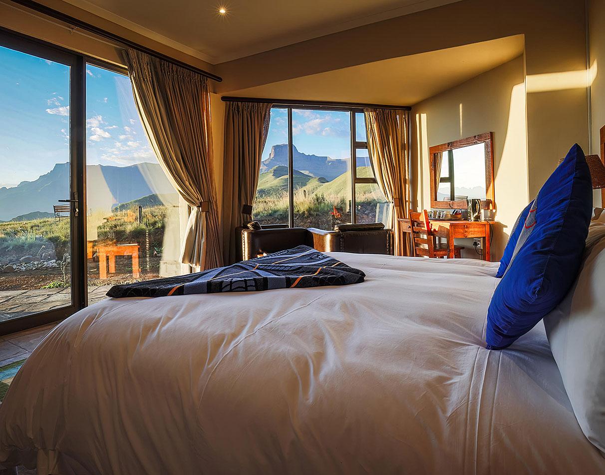 The interior of a guest room at Witsieshoek Mountain Lodge booked on a Drakensberg hiking and safari package.