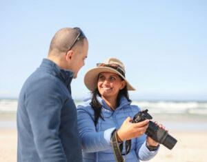 A couple sharing a photography session on the beach in South Africa.