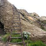 A ladder leading up a mountain ridge to Sentinel Peak.