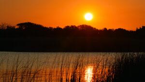 Sunset over the water in iSimangaliso Wetland Park.