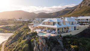 Birkenhead House perched on a cliff with sweeping ocean views.