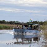 A boat on an estuary as part of a South Africa photo tour.