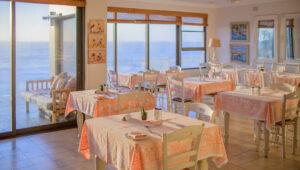 The breakfast room at Fairlight Beach House overlooking the ocean.