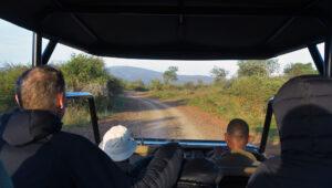Guests and guide heading out on a morning game drive through the bush.
