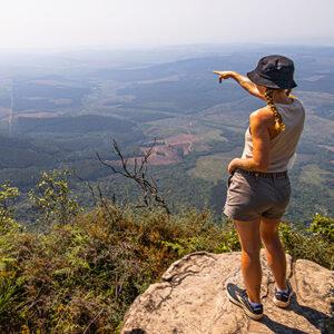 Girl on a hike at a viewpoint along the Panorama Route.