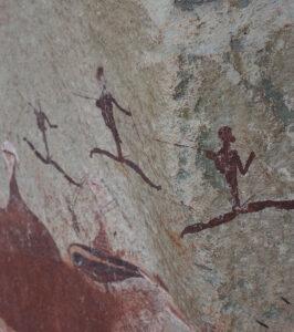 San rock art painting of hunters in Drakensberg area, a favorite amongst cultural attractions in South Africa.