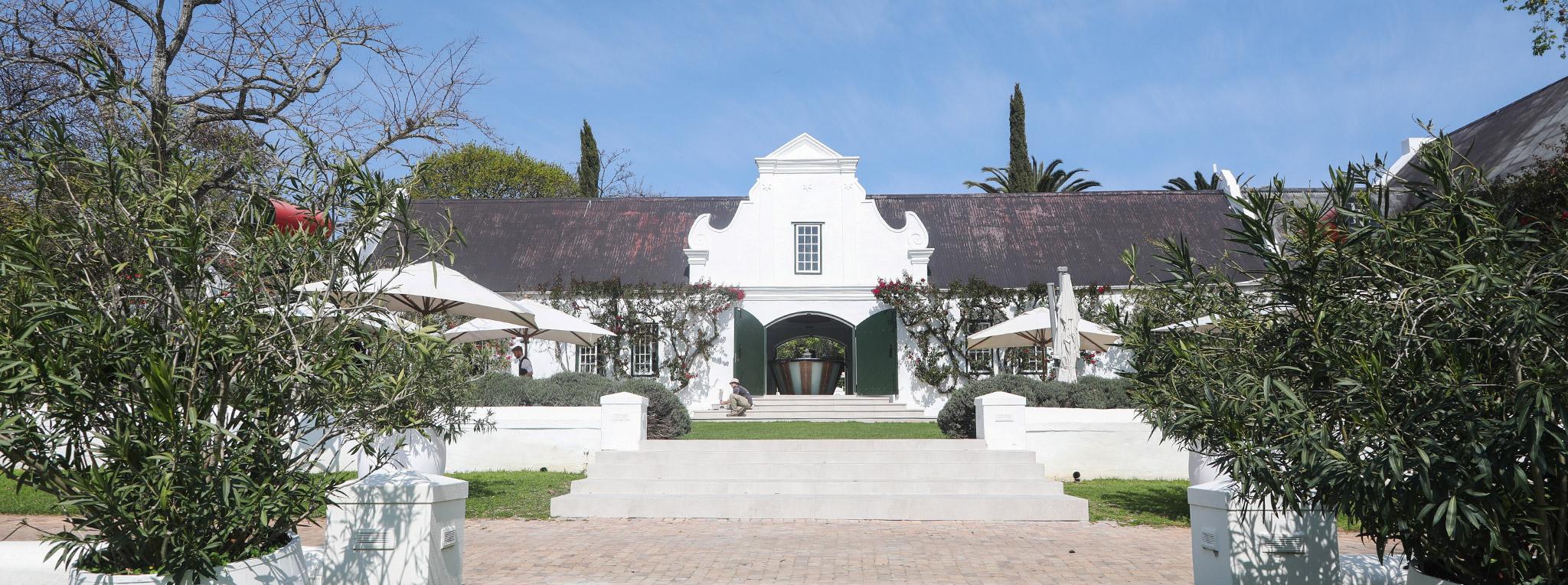 A classic Cape-Dutch building on a wine estate in South Africa's winelands near Cape Town.