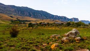 Drakensberg mountains hiking tours with lodges in foreground