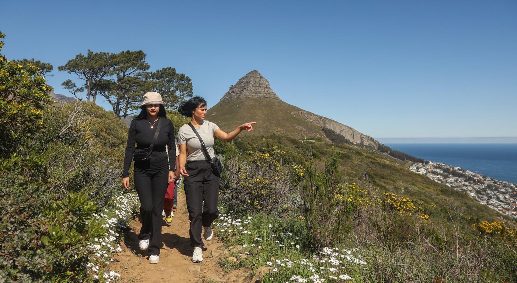 Women hiking near Lion's Head, Cape Town, a top thing to do. Women hiking near Lion's Head, Cape Town, a top thing to do.