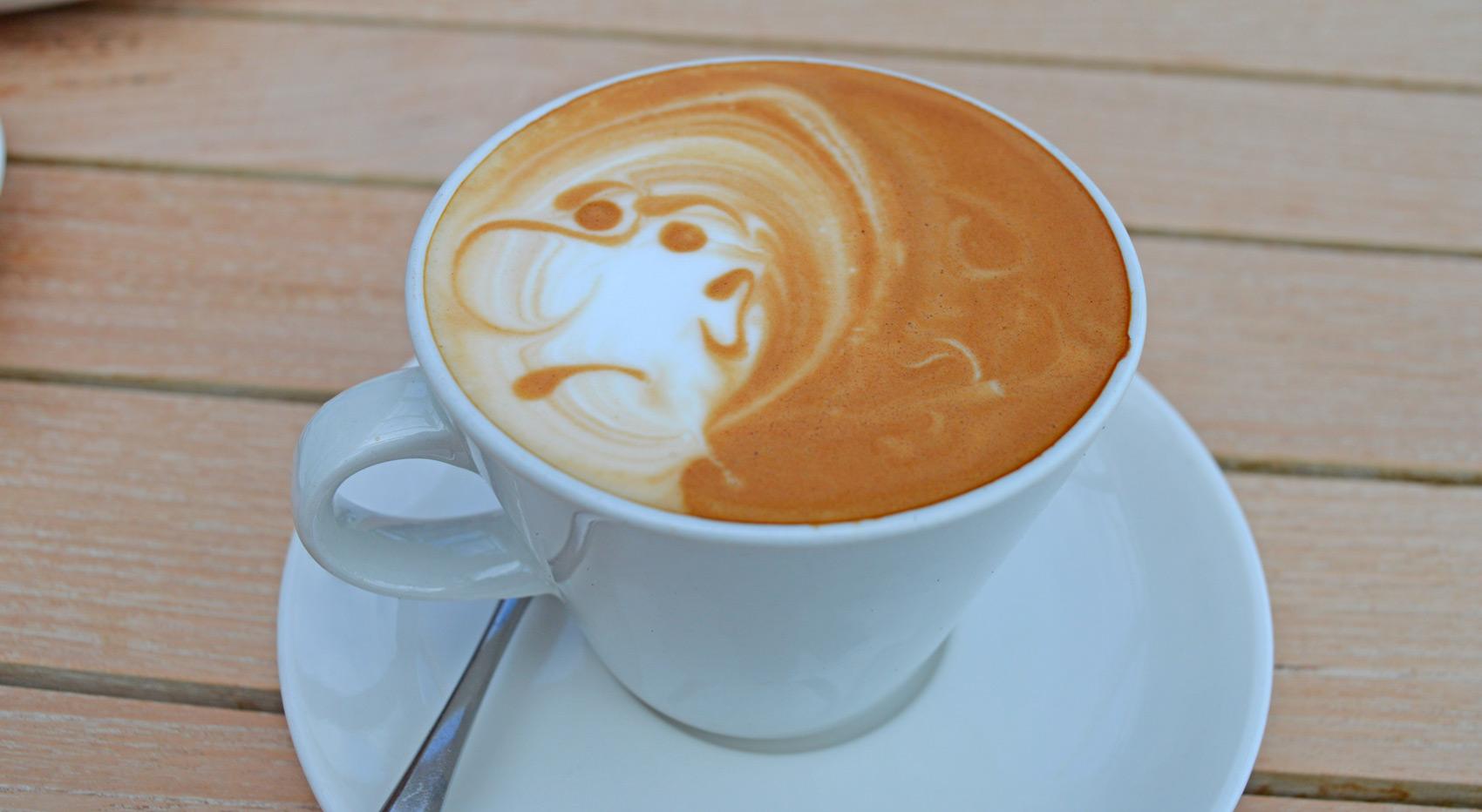 Cape Town coffee art: A latte with a face design, one of the best things to do in South Africa. Cape Town coffee art: A latte with a face design, one of the best things to do in South Africa.