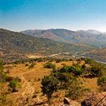 Scenic view of a valley and mountains, ideal for a South Africa self-drive itinerary.
